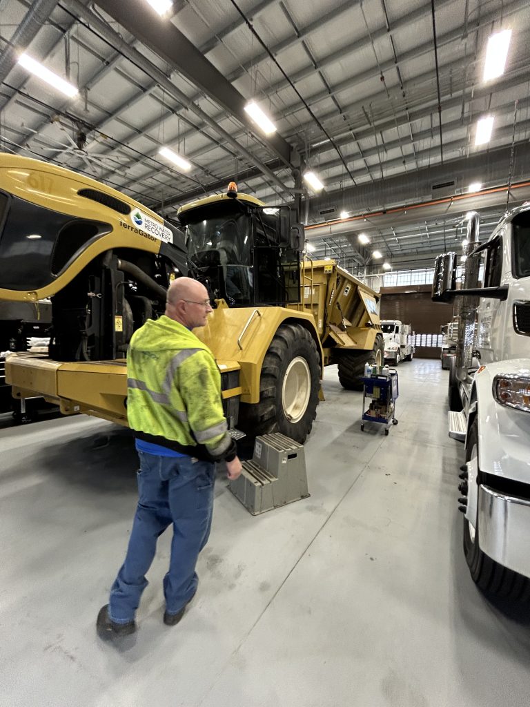 A worker stands by the Terra Gator 3244