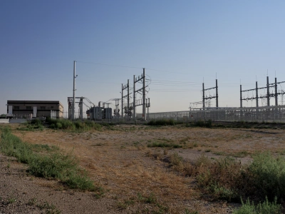 Metro's power station next to several electrical pylons