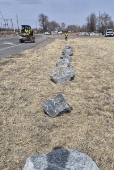 Boulders line the south gate road to add additional security